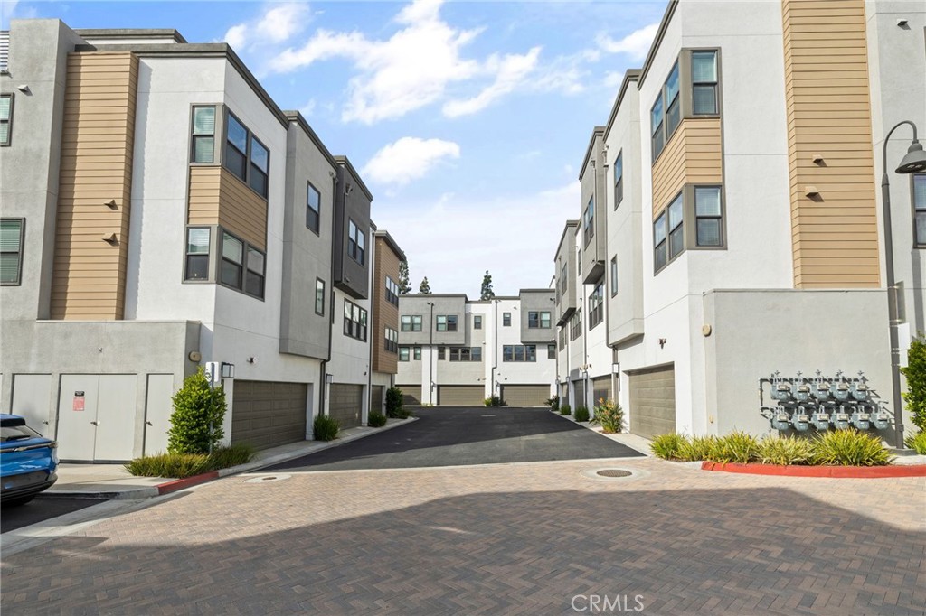 712 South Grable Circle Orange, CA 92868 - Photo 2 of 42 a city street lined with buildings and a street