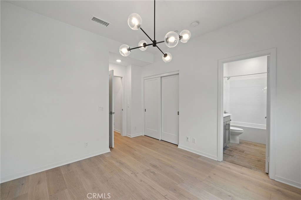 712 South Grable Circle Orange, CA 92868 - Photo 24 of 42 a view of an empty room and a ceiling fan