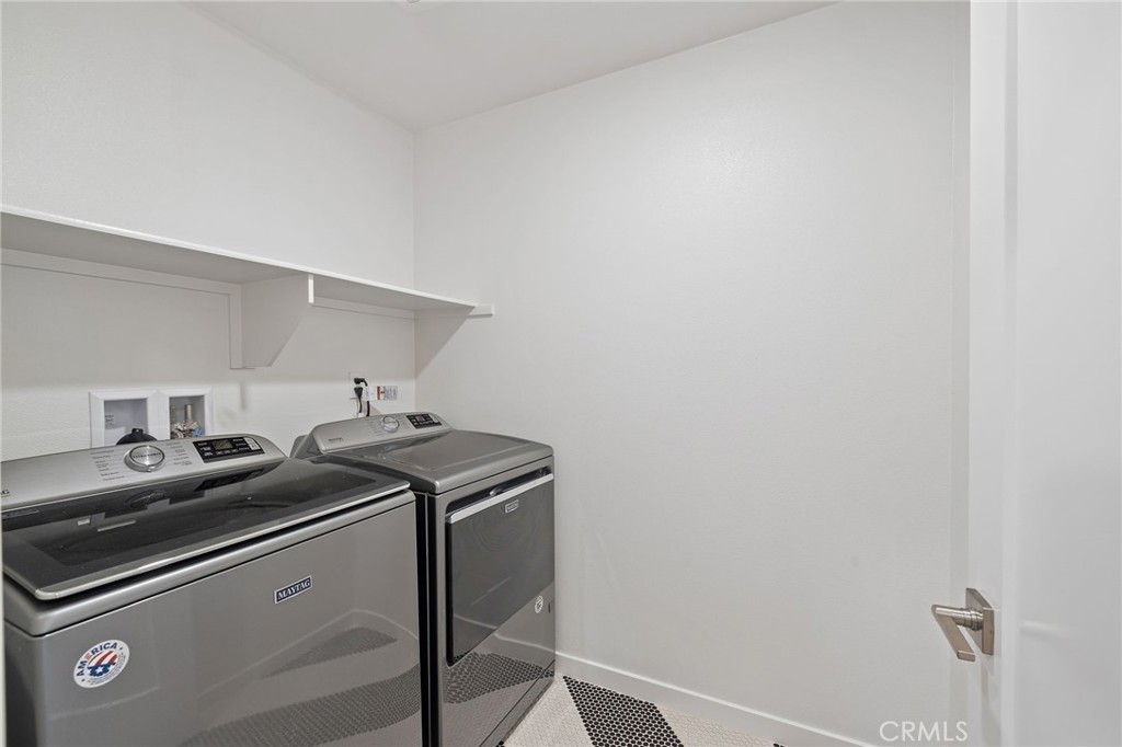 712 South Grable Circle Orange, CA 92868 - Photo 26 of 42 a utility room with dryer and washer
