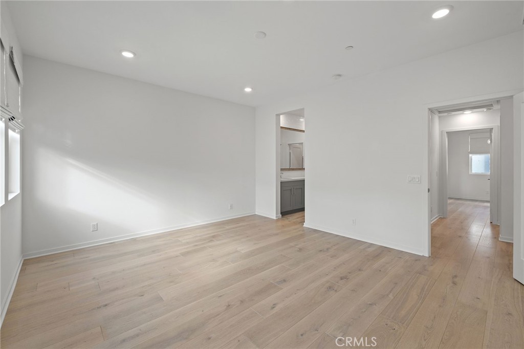 712 South Grable Circle Orange, CA 92868 - Photo 28 of 42 a view of an empty room with wooden floor and closet