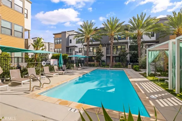 a view of a yard with cars