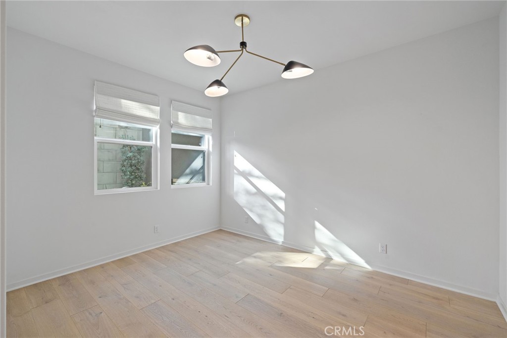 712 South Grable Circle Orange, CA 92868 - Photo 9 of 42 a view of an empty room with a window