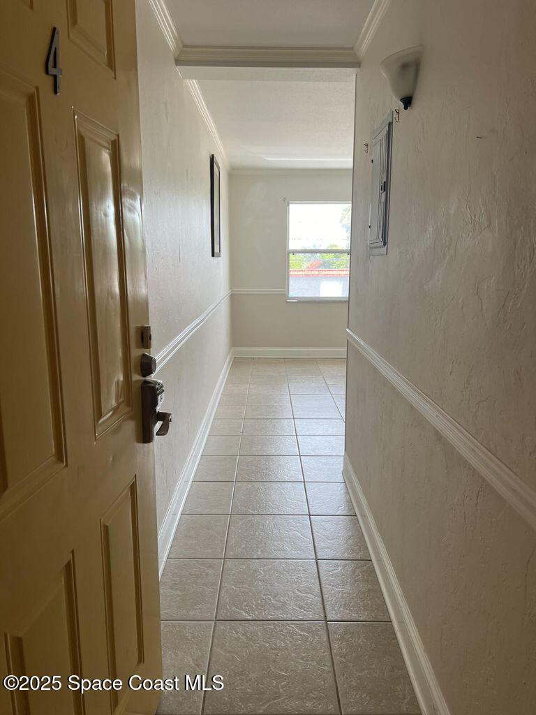 805 Forrest Avenue, Unit 4 Cocoa, FL 32922 - Photo 2 of 9 a view of hallway with windows