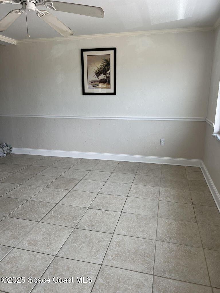 805 Forrest Avenue, Unit 4 Cocoa, FL 32922 - Photo 4 of 9 a view of a room with an empty space and a window