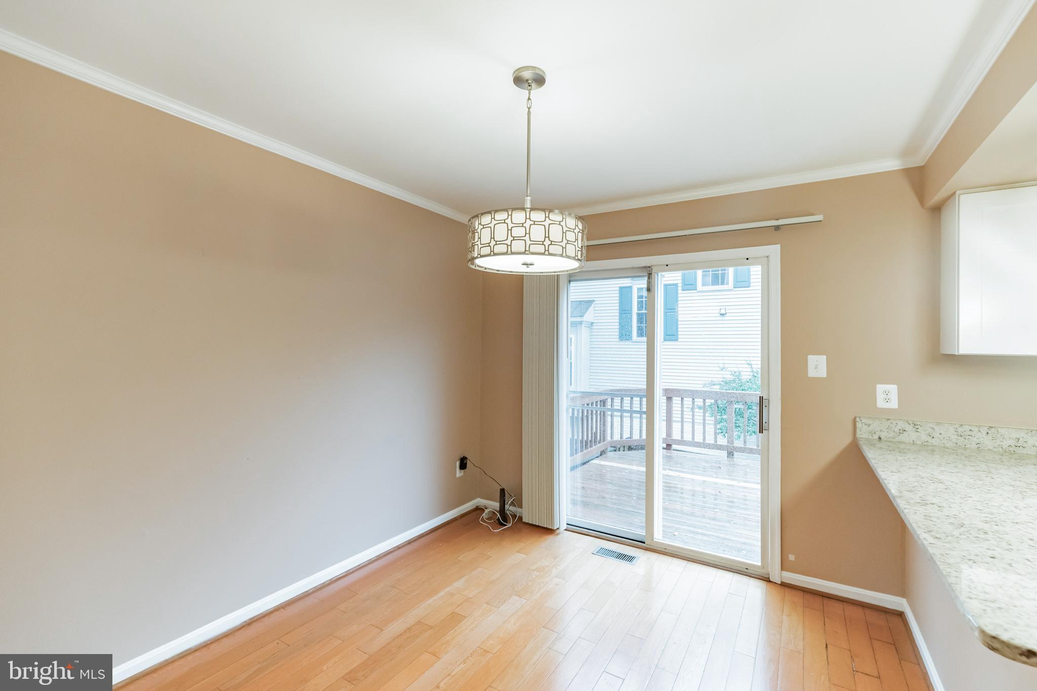 45597 Whitcomb Square Sterling, VA 20166 - Photo 13 of 30 Dining room leading to the deck