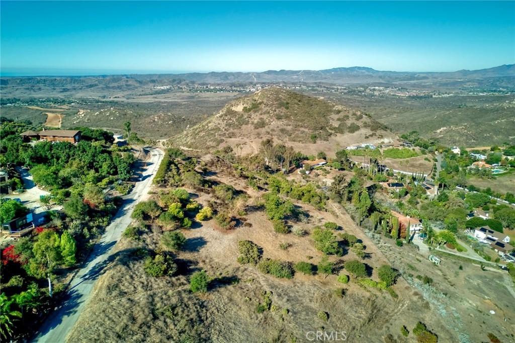 6542 Indian Trail Way Fallbrook, CA 92028 - Photo 16 of 18 an aerial view of residential houses with outdoor space and ocean view