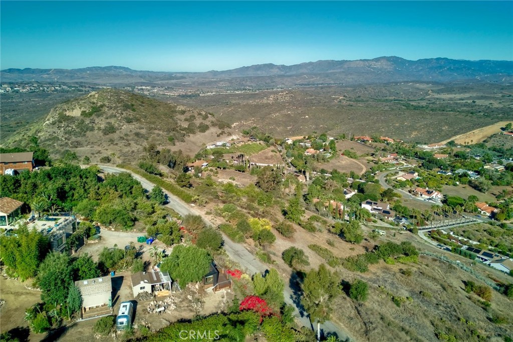6542 Indian Trail Way Fallbrook, CA 92028 - Photo 17 of 18 an aerial view of residential houses with outdoor space and trees