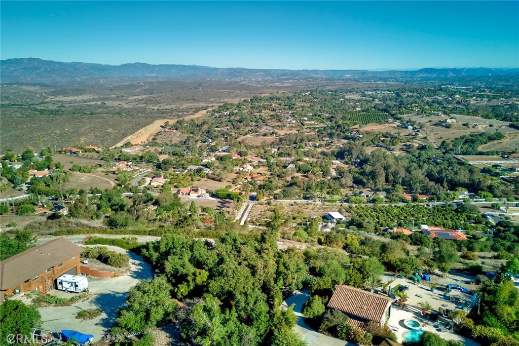 6542 Indian Trail Way Fallbrook, CA 92028 - Photo 18 of 18 an aerial view of residential house with outdoor space and trees around