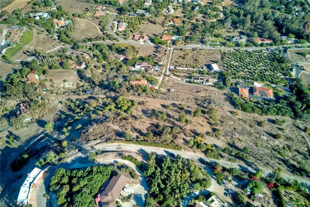 an aerial view of residential building and ocean