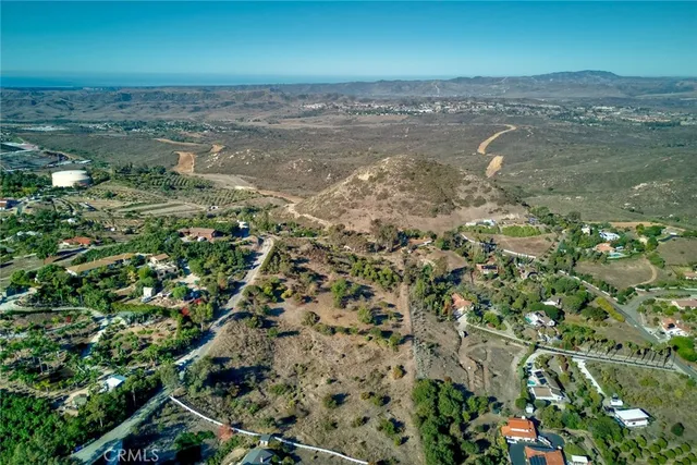 an aerial view of residential house with outdoor space