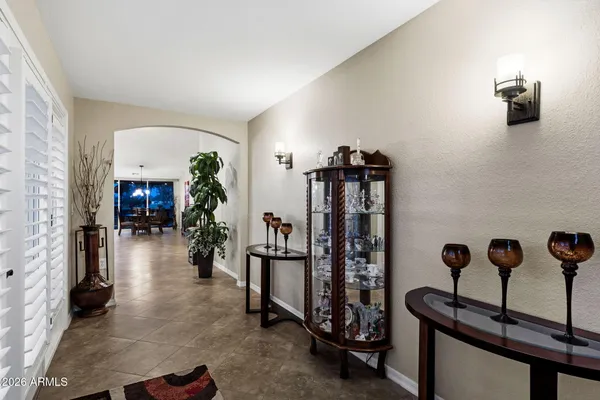 a very nice looking dining room with many windows