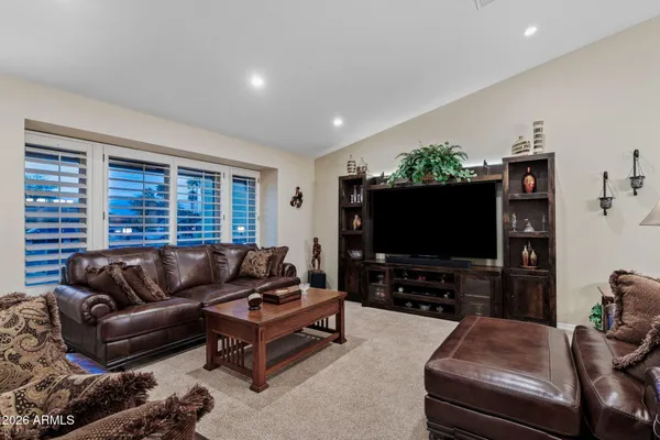 a very nice looking room with lots of stuff and furniture