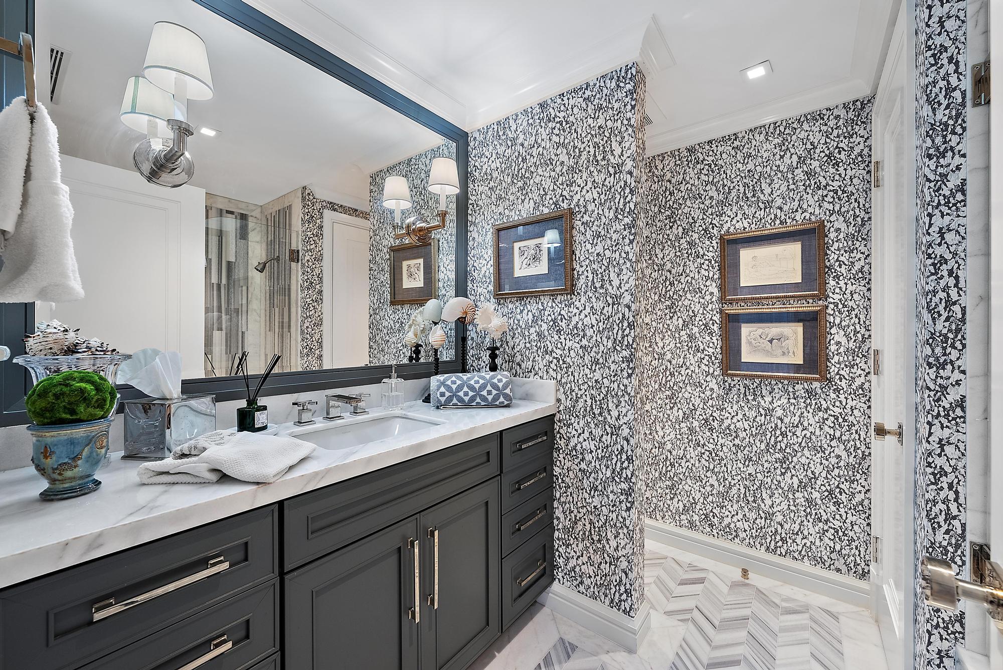 2500 South Ocean Boulevard, Unit 1 D 2 Palm Beach, FL 33480 - Photo 19 of 42 a bathroom with a sink a vanity and a mirror