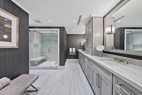 a view of swimming pool with outdoor seating and city view