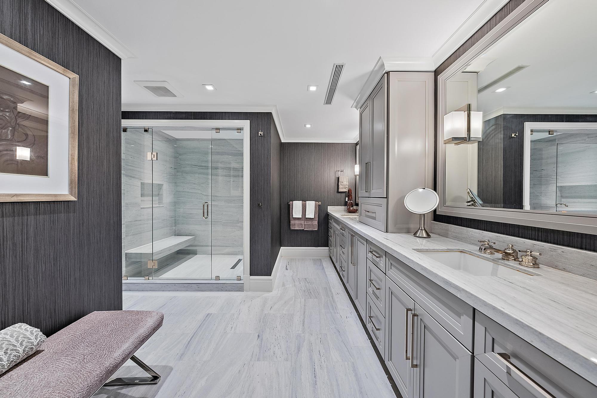 2500 South Ocean Boulevard, Unit 1 D 2 Palm Beach, FL 33480 - Photo 22 of 42 a bathroom with a sink a mirror and a bathtub