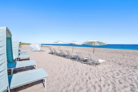 a view of a city with lawn chairs