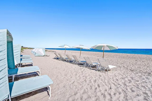 a view of a city with lawn chairs