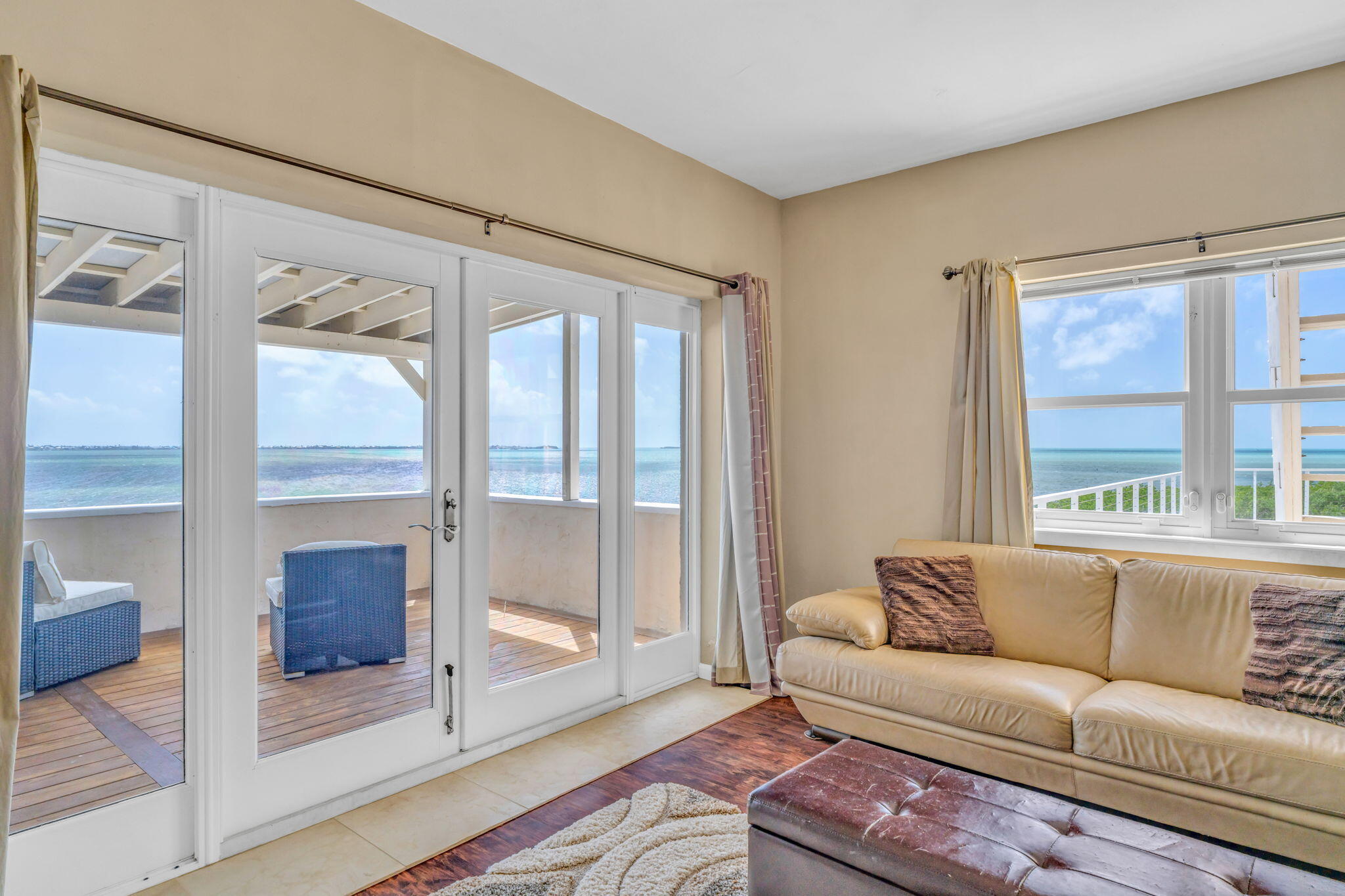 225 Colson Drive Cudjoe, FL 33042 - Photo 20 of 71 a living room with furniture and a large window
