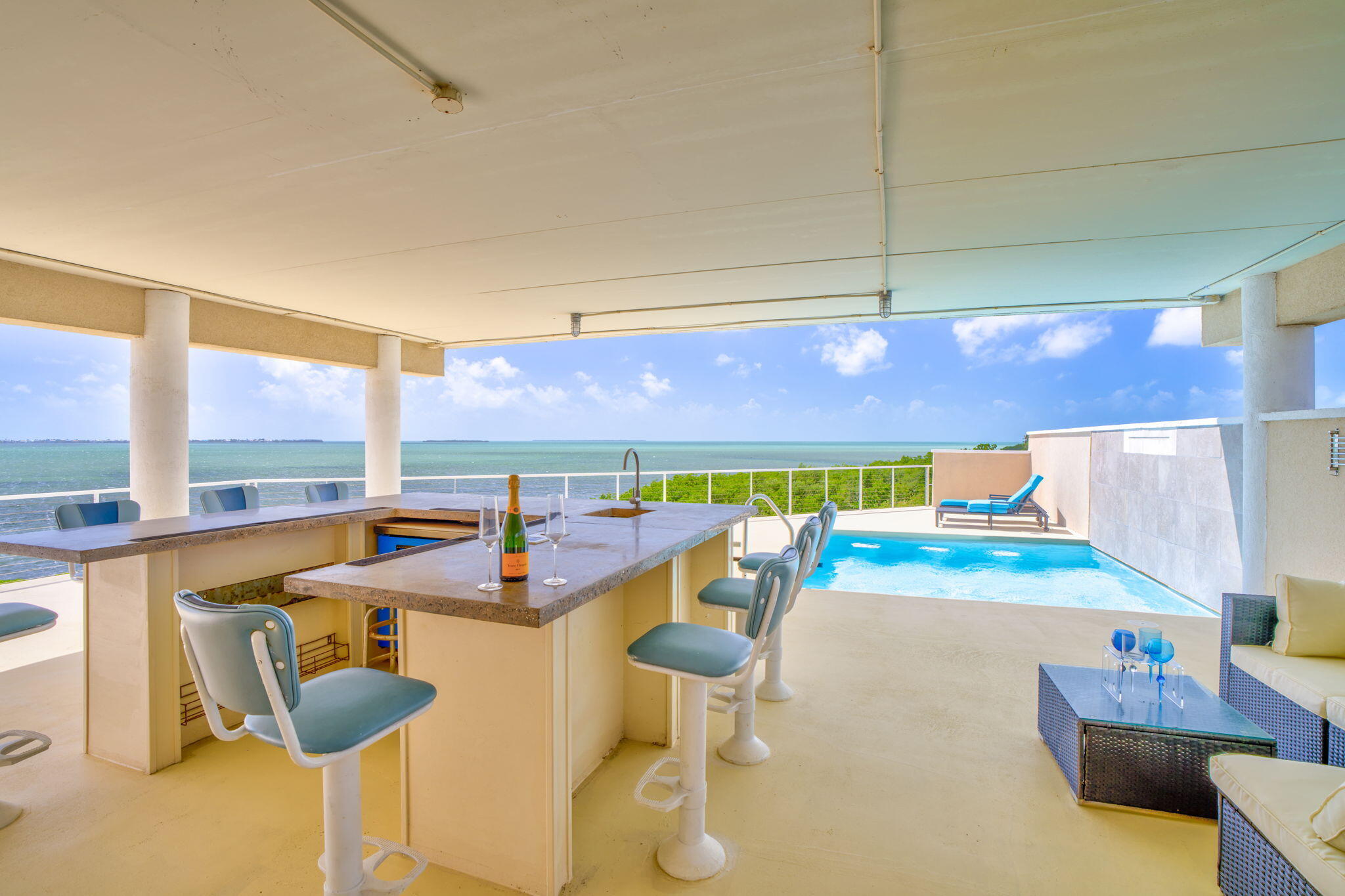 225 Colson Drive Cudjoe, FL 33042 - Photo 29 of 71 a dining room with furniture and window