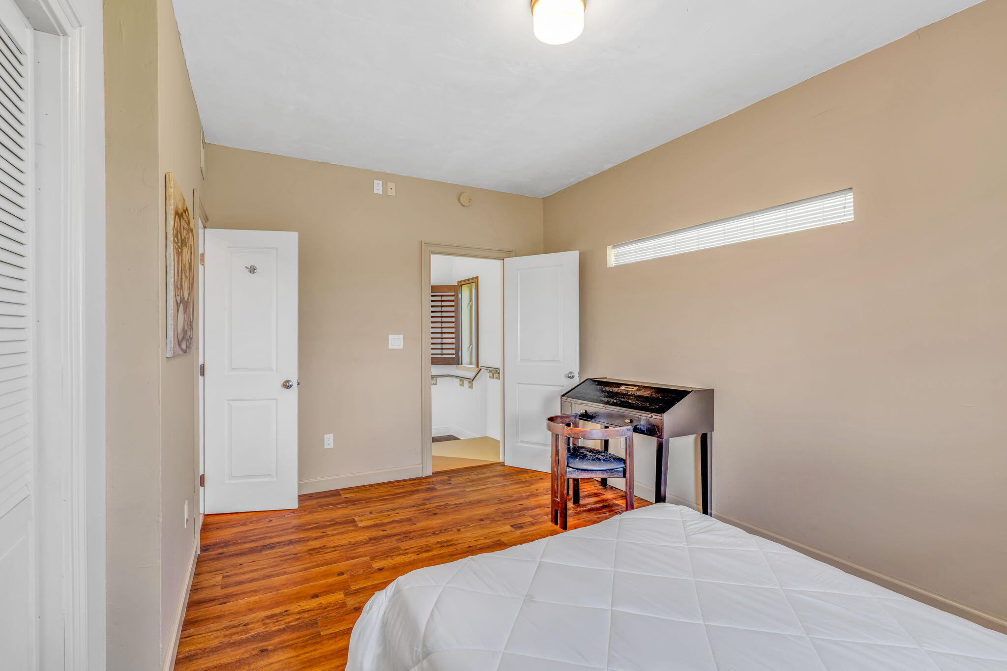 225 Colson Drive Cudjoe, FL 33042 - Photo 36 of 71 a bedroom with a bed and a cabinets