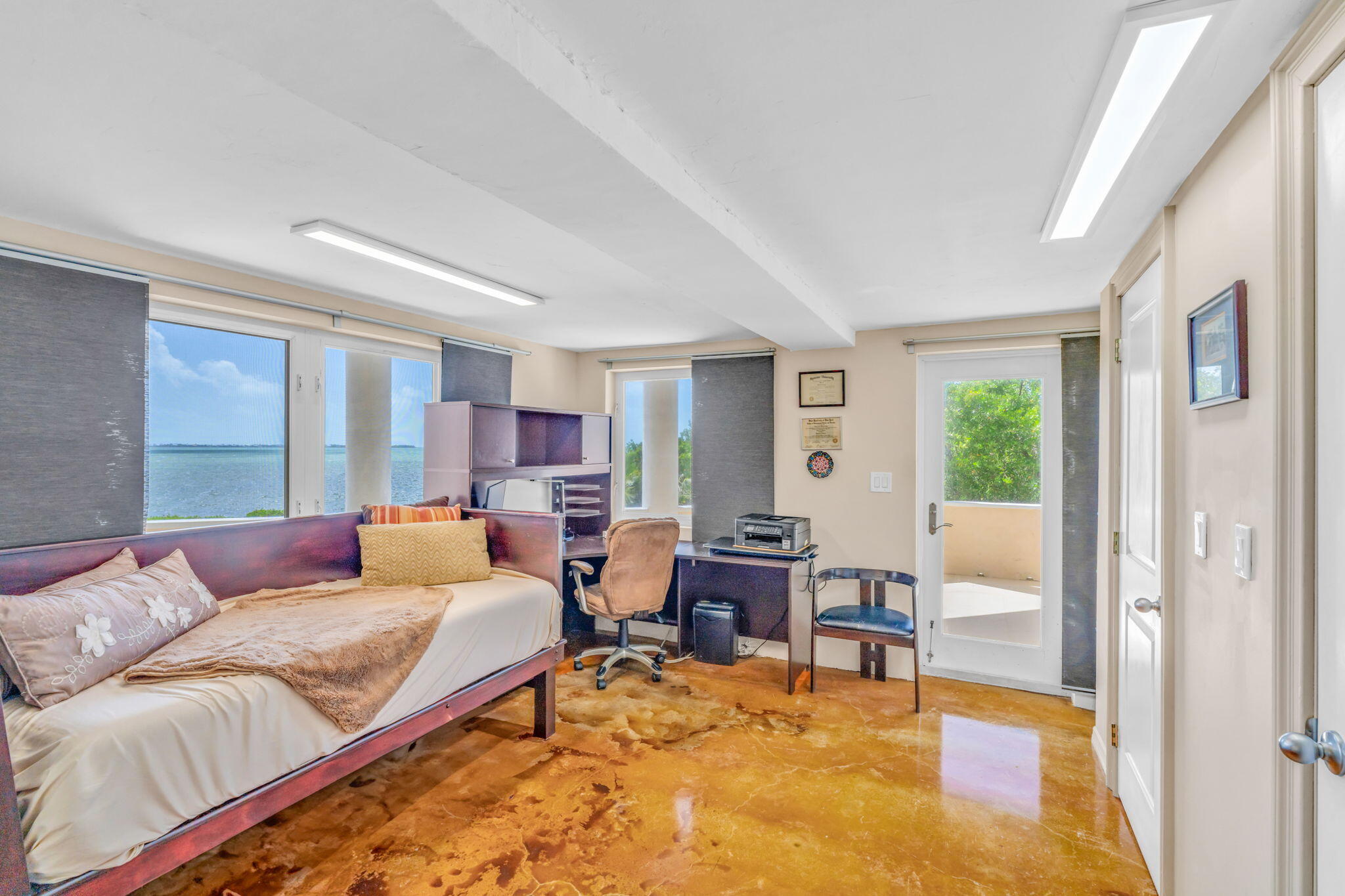 225 Colson Drive Cudjoe, FL 33042 - Photo 39 of 71 a living room with furniture and a window