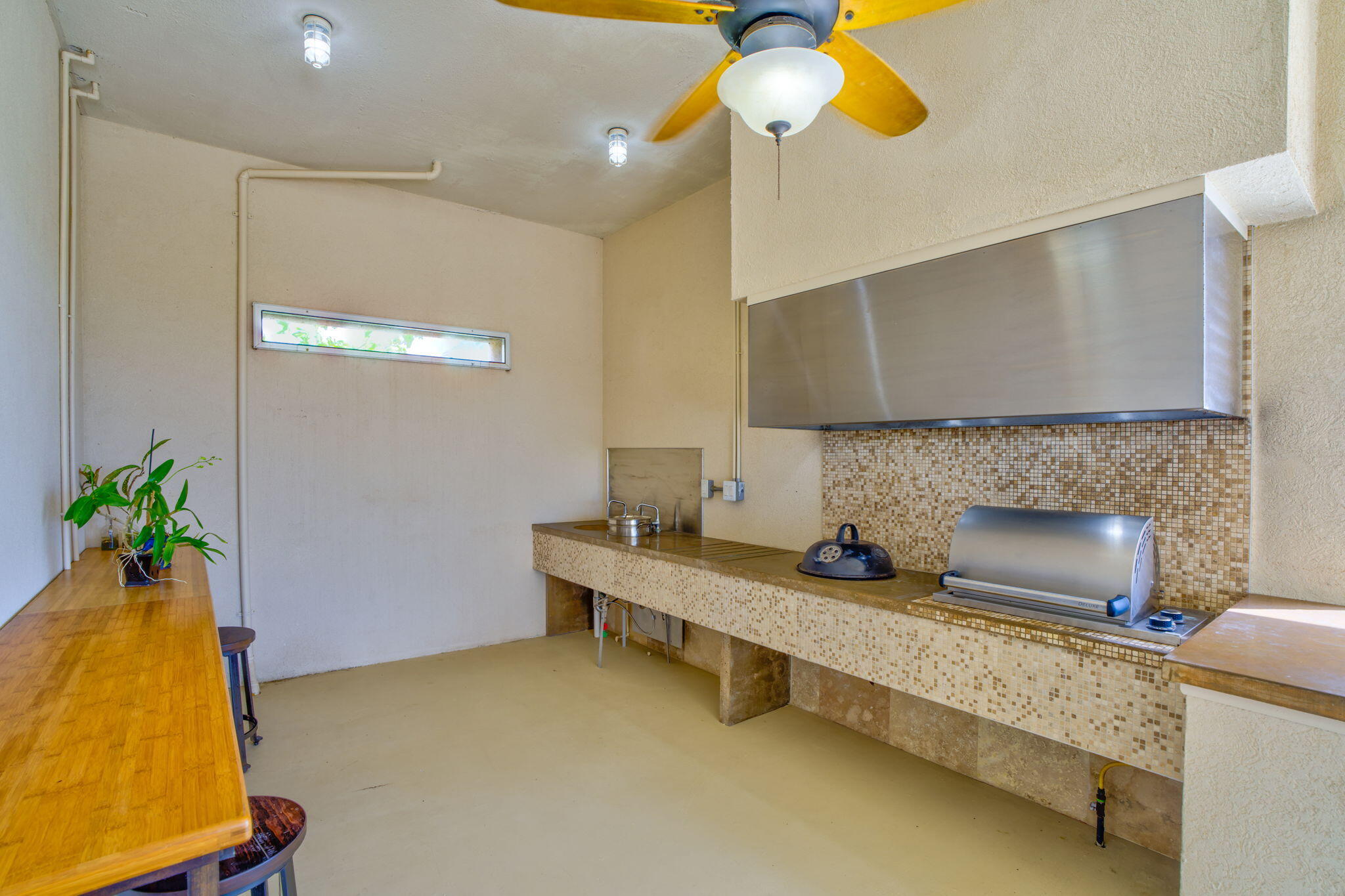 225 Colson Drive Cudjoe, FL 33042 - Photo 46 of 71 a kitchen with a sink and a refrigerator