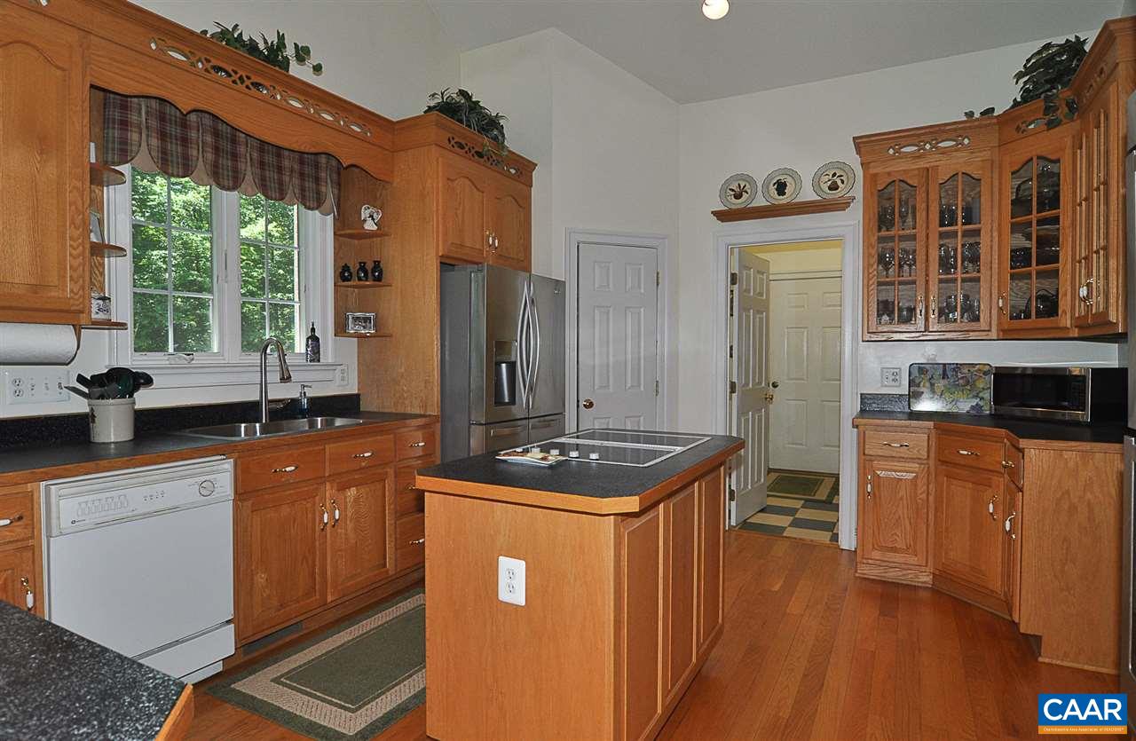 165 Jacks Shop Road Rochelle, VA 22738 - Photo 15 of 48 a kitchen with stainless steel appliances granite countertop a sink stove and refrigerator