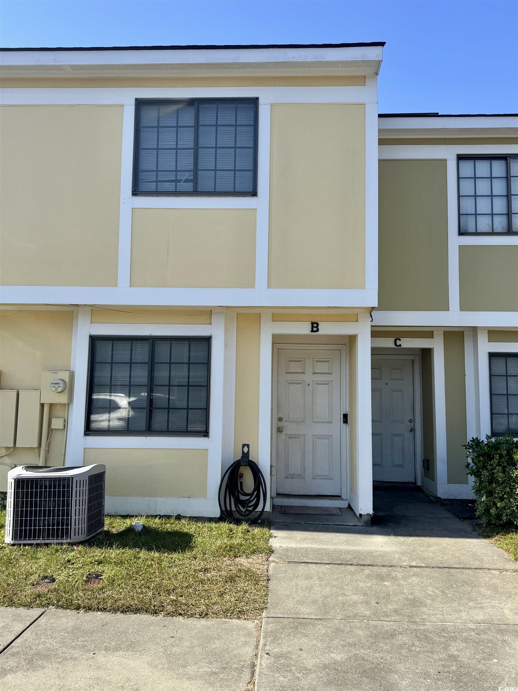1207 Pinegrove Drive, Unit B Myrtle Beach, SC 29577 - Photo 2 of 16 View of front of property with stucco siding