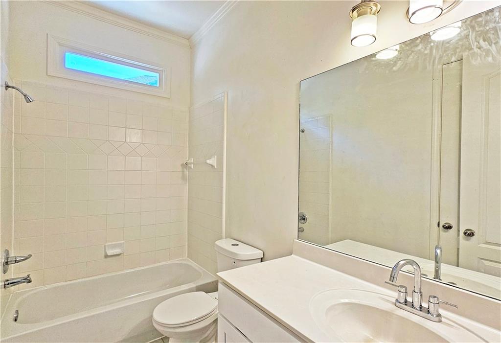 195 Beracah Walk Atlanta, GA 30331 - Photo 18 of 32 a bathroom with a sink a toilet and shower