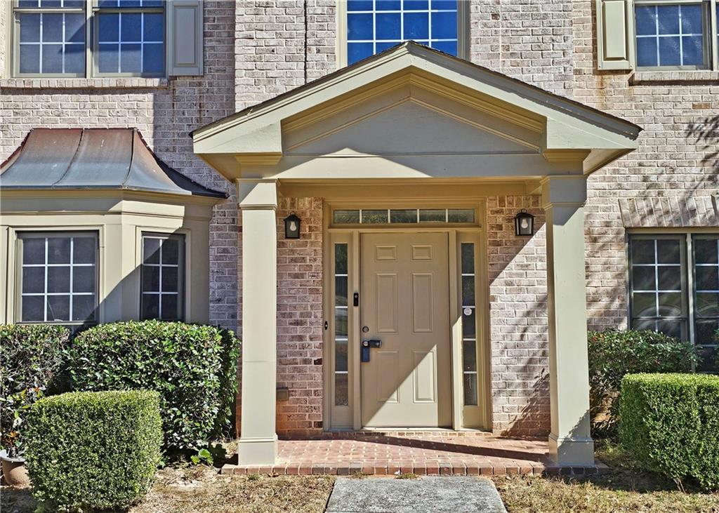 195 Beracah Walk Atlanta, GA 30331 - Photo 2 of 32 a view of a house with wooden floor and a potted plant