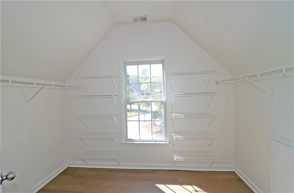195 Beracah Walk Atlanta, GA 30331 - Photo 24 of 32 a view of a small space with wooden floor and a window