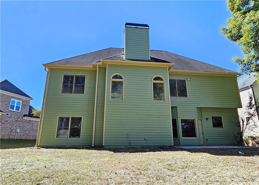 195 Beracah Walk Atlanta, GA 30331 - Photo 29 of 32 a front view of a house with a yard