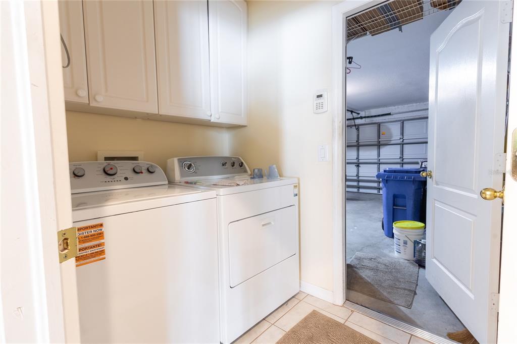 1812 Flower Branch Way Valrico, FL 33594 - Photo 20 of 42 a kitchen with a sink and cabinets