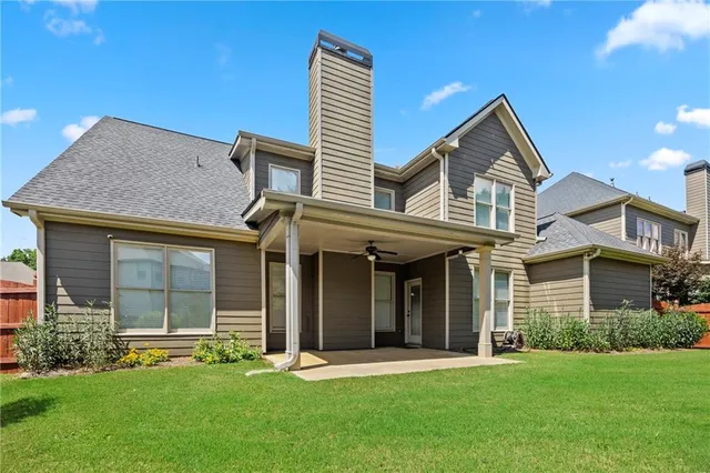 front view of a house with a yard