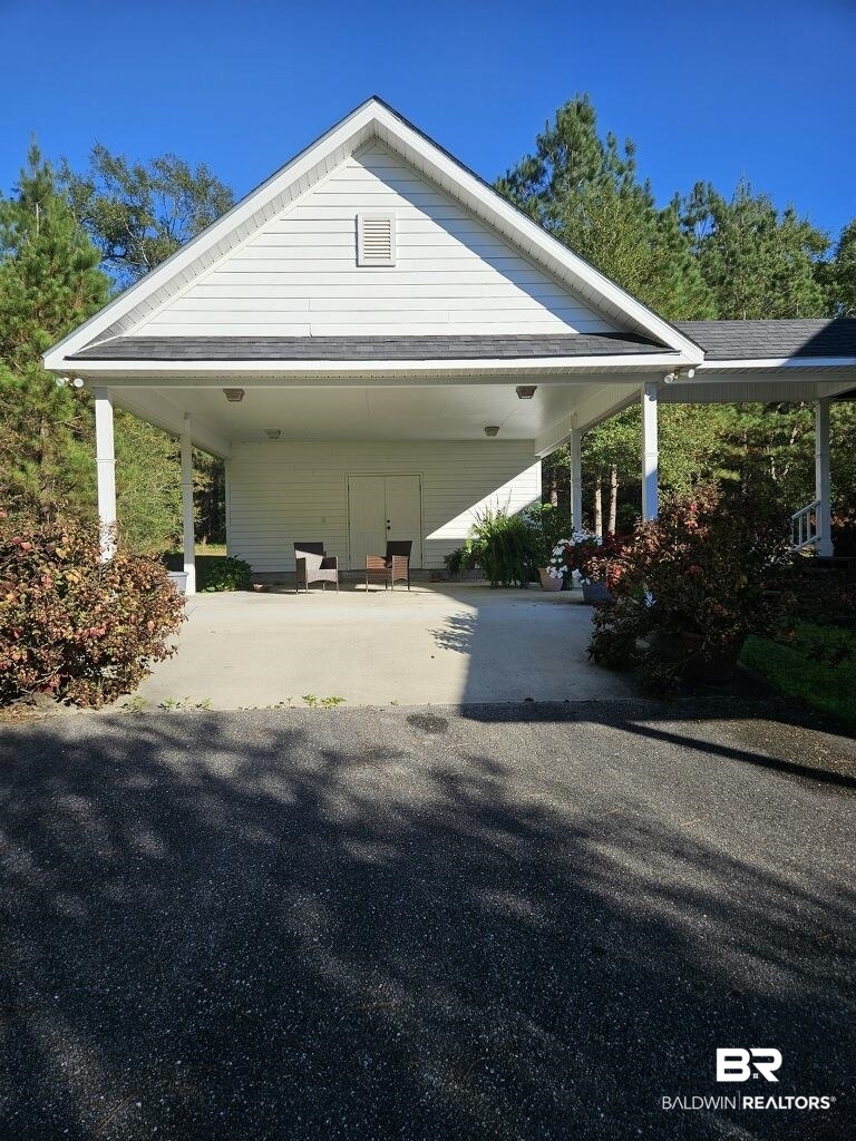 45820 Phillipsville Road Bay Minette, AL 36507 - Photo 3 of 15 View of vehicle parking featuring a carport