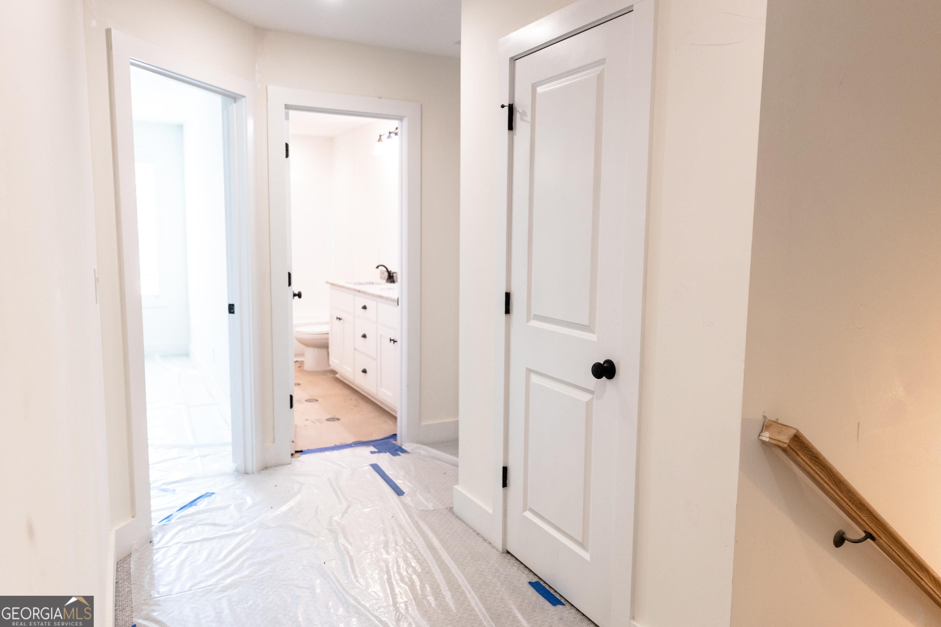 632 Campbell Road Covington, GA 30014 - Photo 31 of 60 a view of a bedroom with wooden floor and bathroom