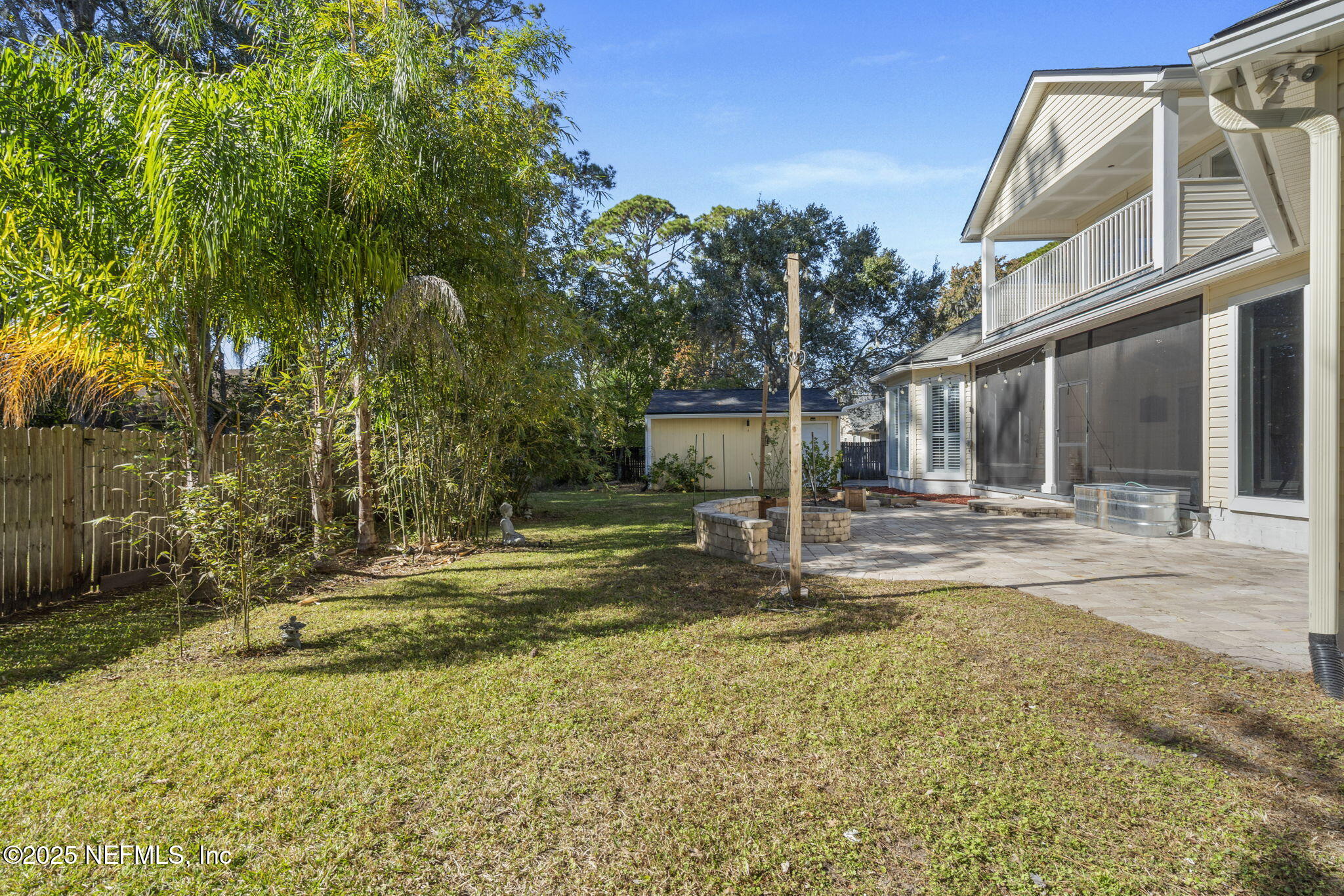 932 Clay Street Fleming Island, FL 32003 - Photo 45 of 50 a view of a house with a yard