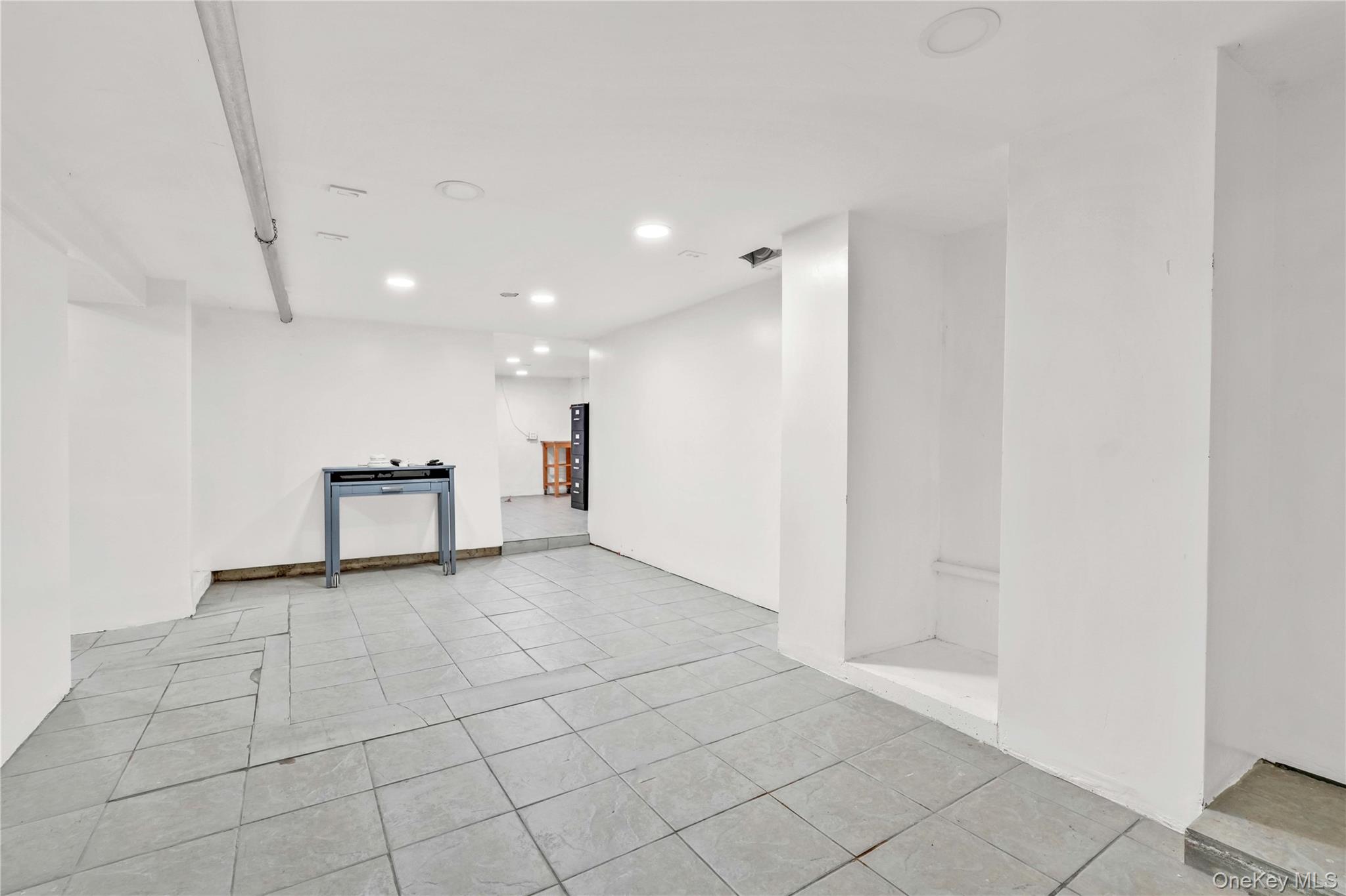 80-63 87th Road Queens, NY 11421 - Photo 14 of 50 basement room.