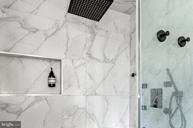 a room with lots of different colored cloths