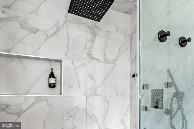 a room with lots of different colored cloths