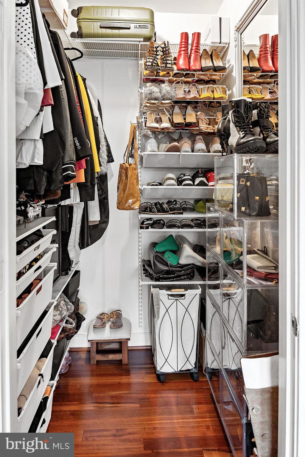 181 East Reed Avenue, Unit 207 Alexandria, VA 22305 - Photo 34 of 41 a room with lots of different colored cloths