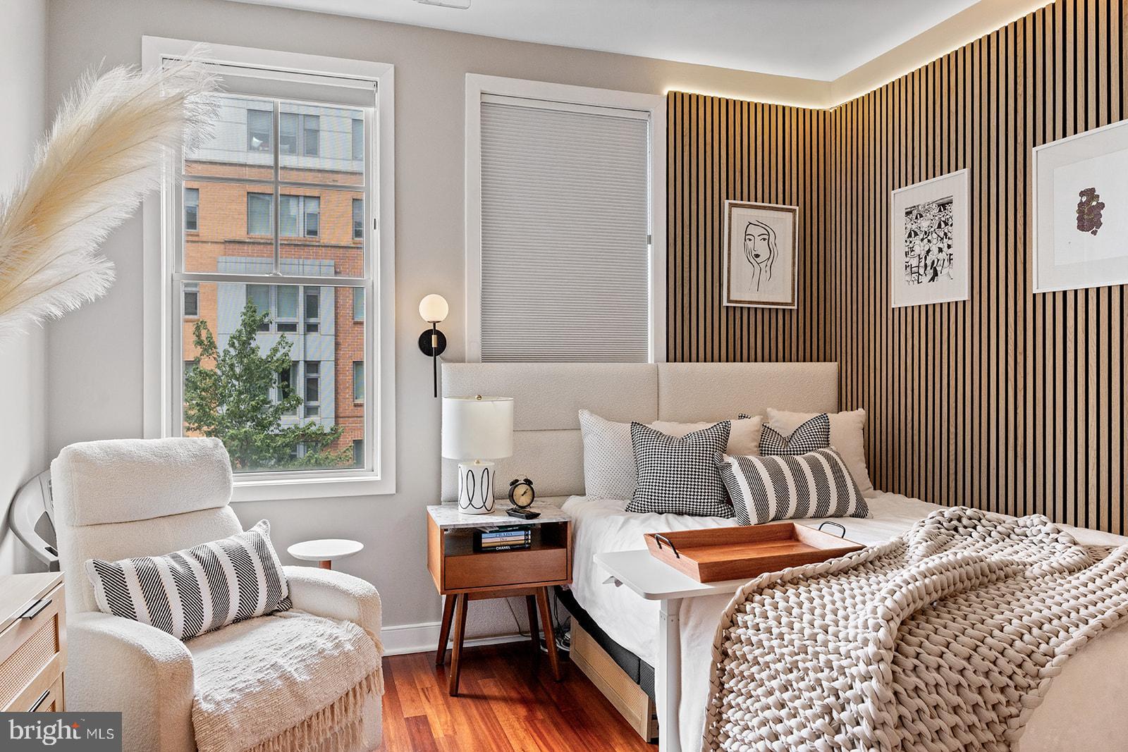 181 East Reed Avenue, Unit 207 Alexandria, VA 22305 - Photo 36 of 41 a bedroom with furniture and a window