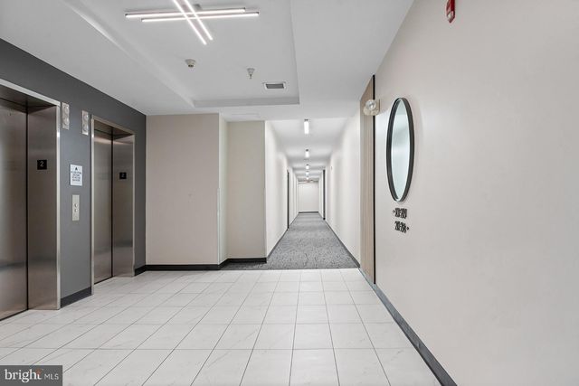 a view of a small space with wooden floor