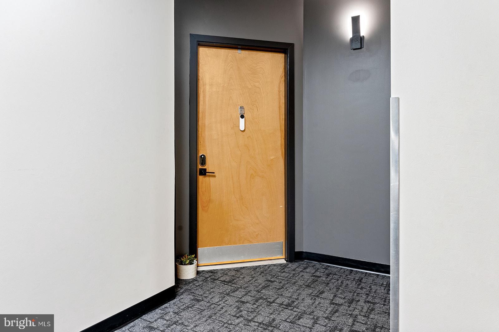 181 East Reed Avenue, Unit 207 Alexandria, VA 22305 - Photo 8 of 41 a view of a small space with wooden floor