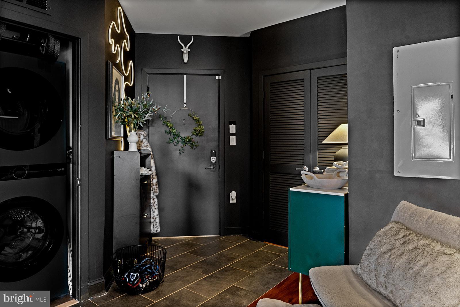 181 East Reed Avenue, Unit 207 Alexandria, VA 22305 - Photo 9 of 41 a living room with furniture and a fireplace