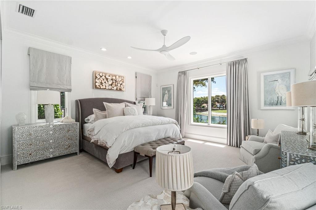 16755 Lucarno Way Naples, FL 34110 - Photo 12 of 50 a bed room with furniture and a window