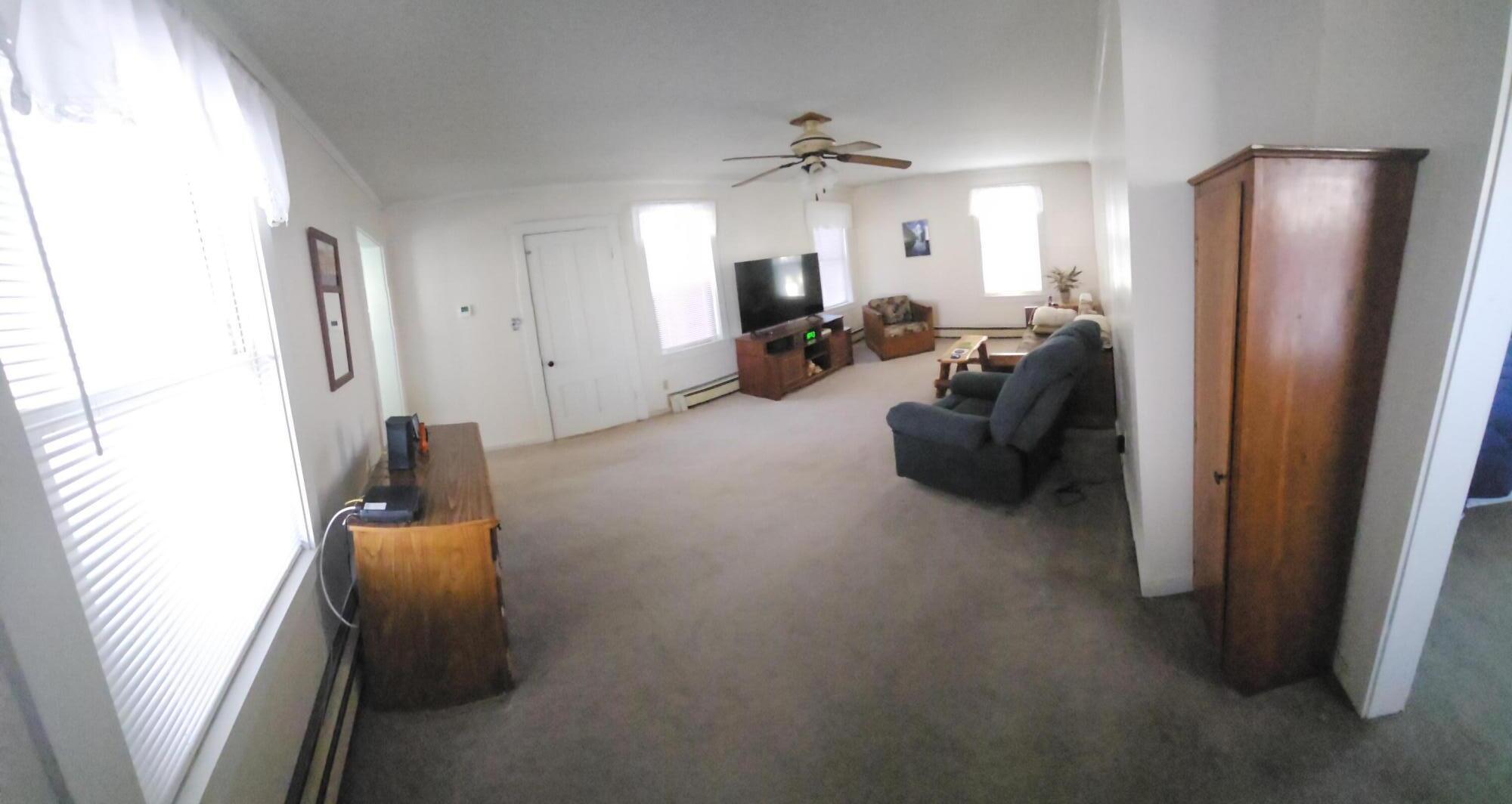 28 Sebago Road Hiram, ME 04041 - Photo 6 of 20 Carpeted Living Room