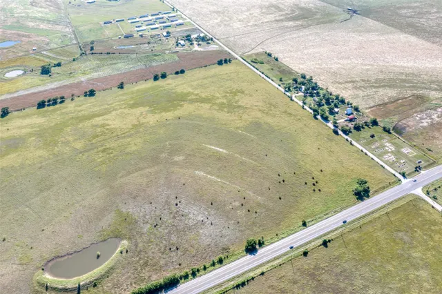 an aerial view of beach and ocean