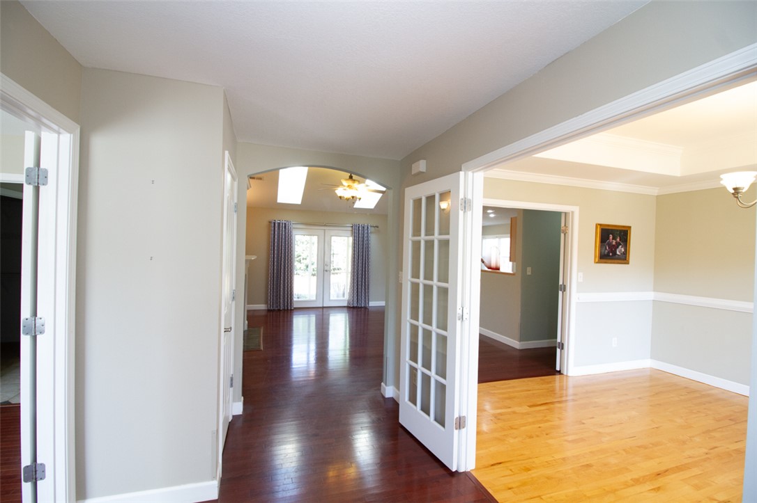 735 Britton Street Anderson, SC 29621 - Photo 7 of 50 This inviting home offers gleaming hardwood floors throughout its versatile living spaces.