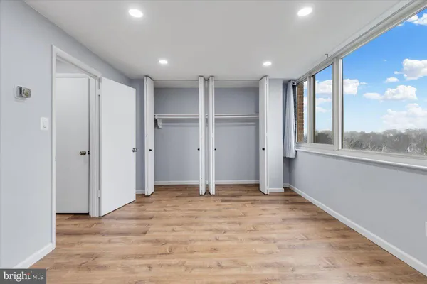 a view of an empty room with a window